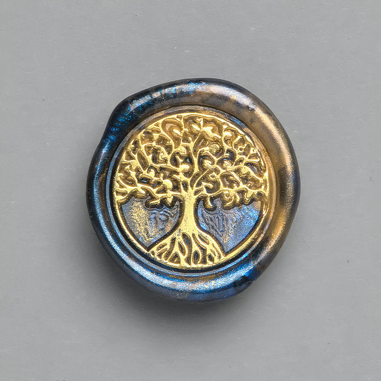 Blau-Gold marmoriertes Wachssiegel in Premiumqualität mit dem Motiv „Baum“ veredelt mit goldenen Akzenten.