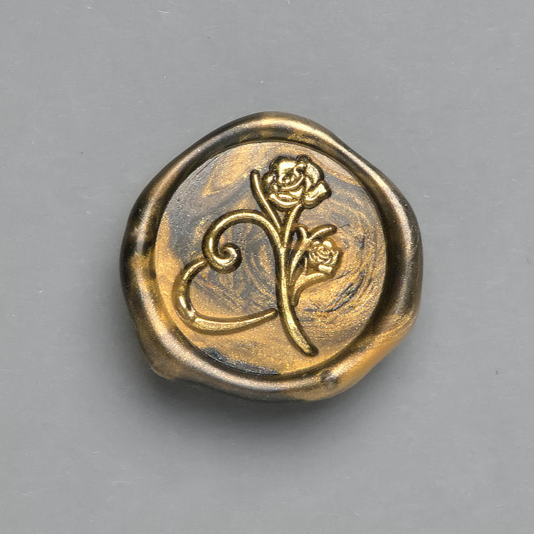Schwarz-Gold marmoriertes Wachssiegel mit dem Motiv Rose mit Herz mit goldenen Akzenten für romantische Einladungkarten.